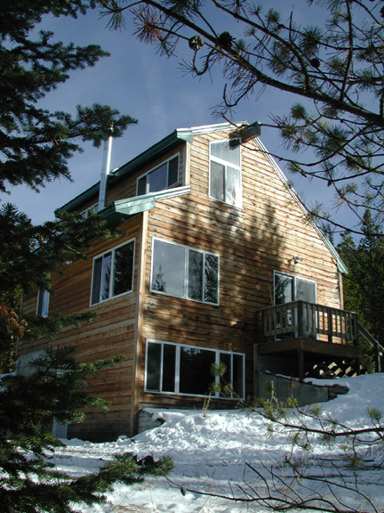 View of cabin in
                        early winter